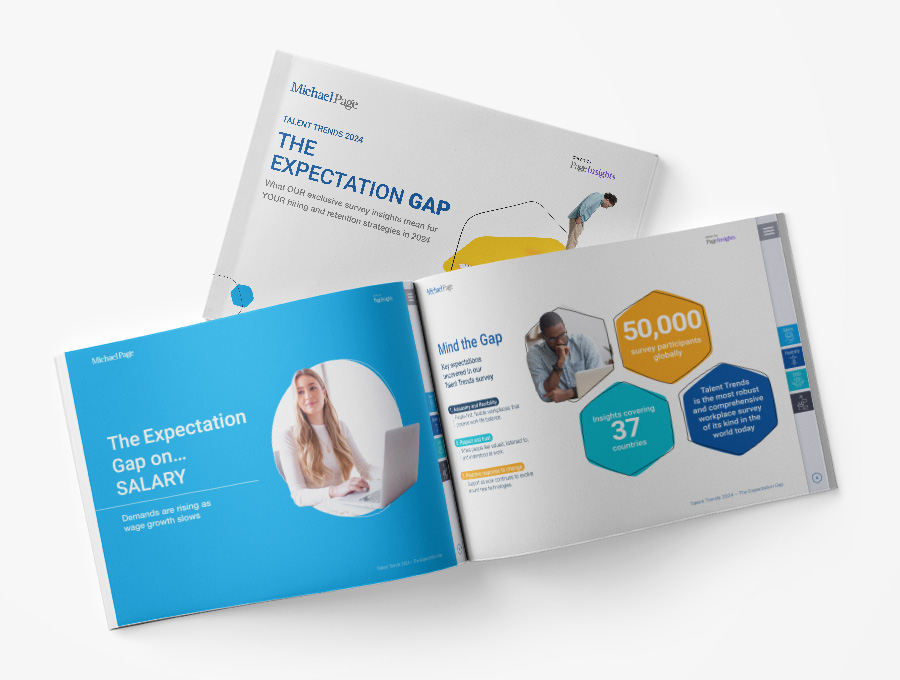 Three books open showing insights on expectation gaps and survey results.