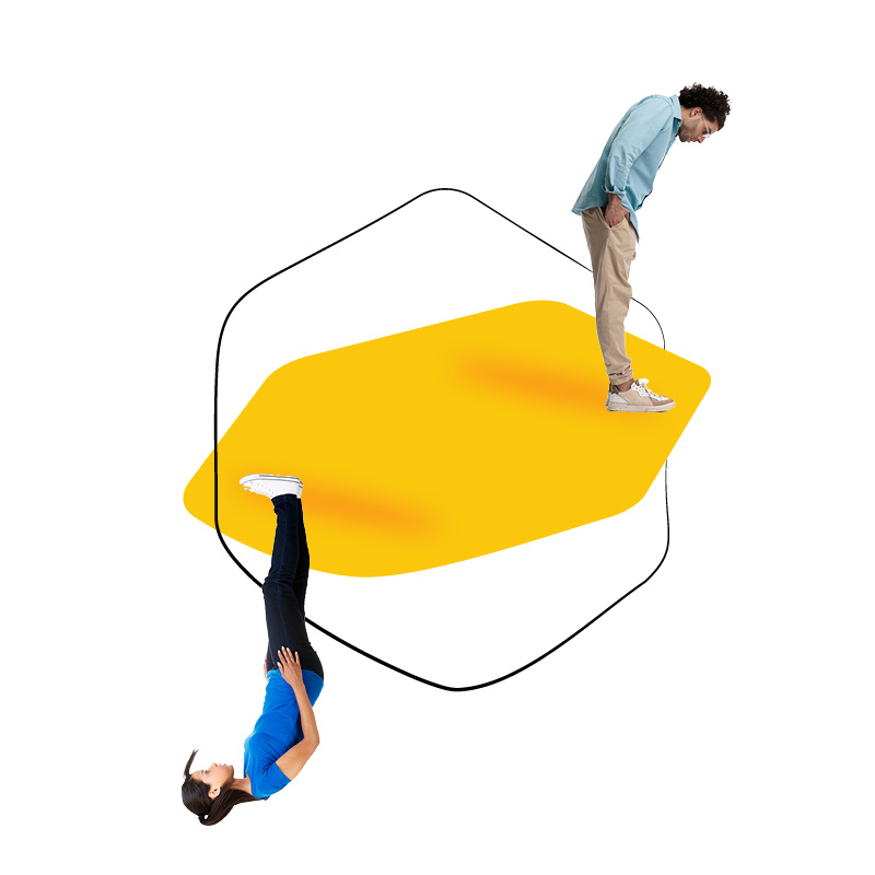Two people standing and upside-down on a yellow polygon shape