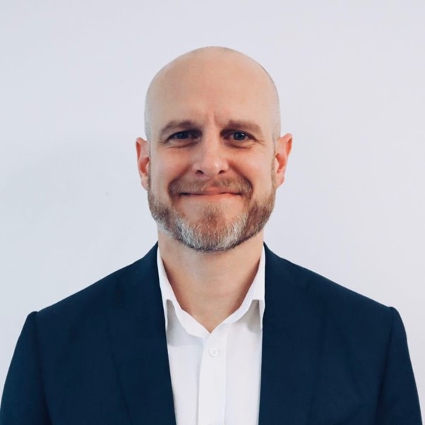 Bald guy smiling