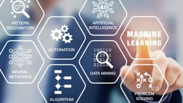 Person interacting with hexagons labeled with technology concepts.