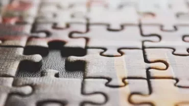 Close-up of a puzzle with a missing piece
