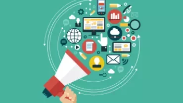 A hand holding a megaphone with digital icons illustrating online marketing.