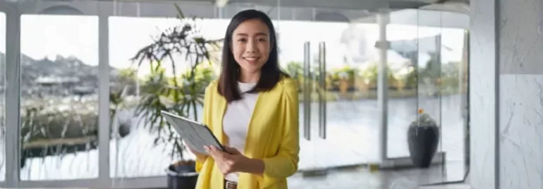 A professional smiles showing confidence in asking for a pay rise