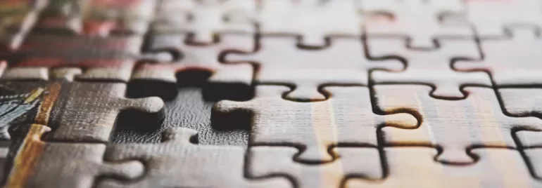 Close-up of a puzzle with a missing piece