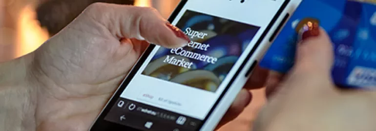 Person using smartphone for online shopping