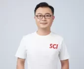 Person wearing a white T-shirt with 'SCI' text