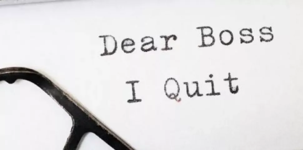 Text on paper reads 'Dear Boss, I Quit'.