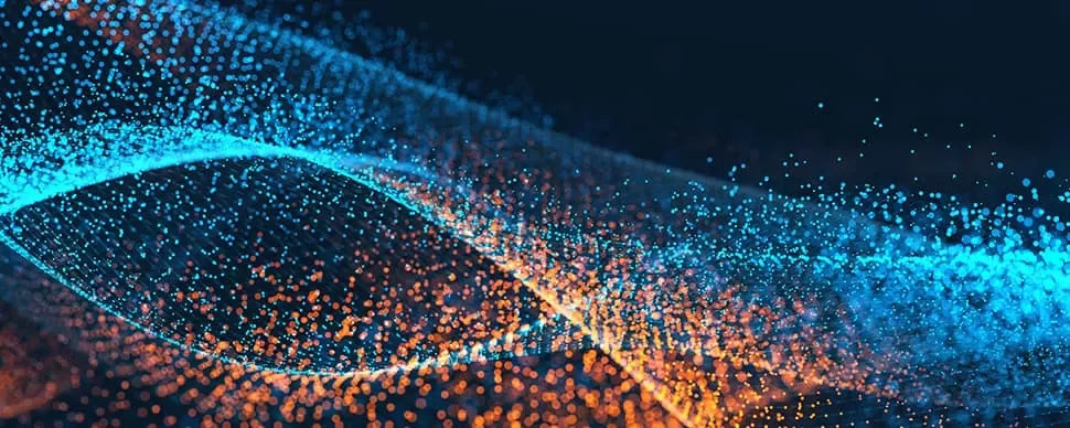 Blue and orange particles forming an interwoven wave pattern.