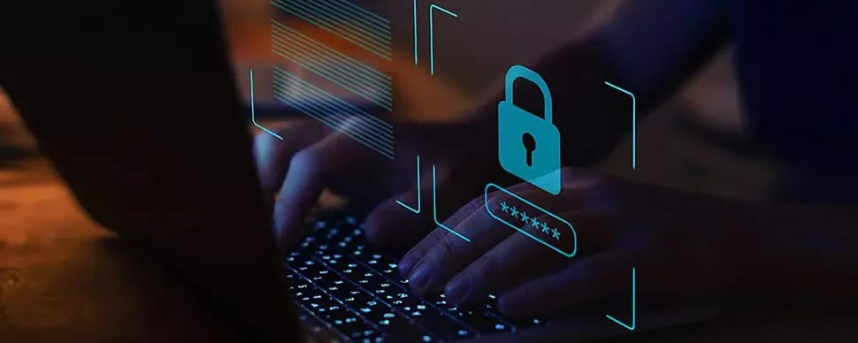 Hands typing on a keyboard with a padlock icon, symbolizing cybersecurity.