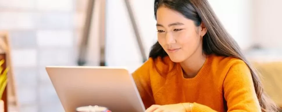 A person is working on a laptop.