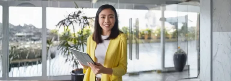 A professional smiles showing confidence in asking for a pay rise
